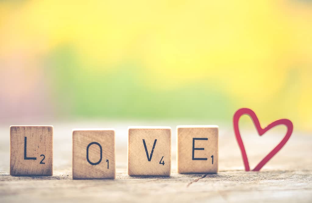 Scrabble tiles formed in the word love