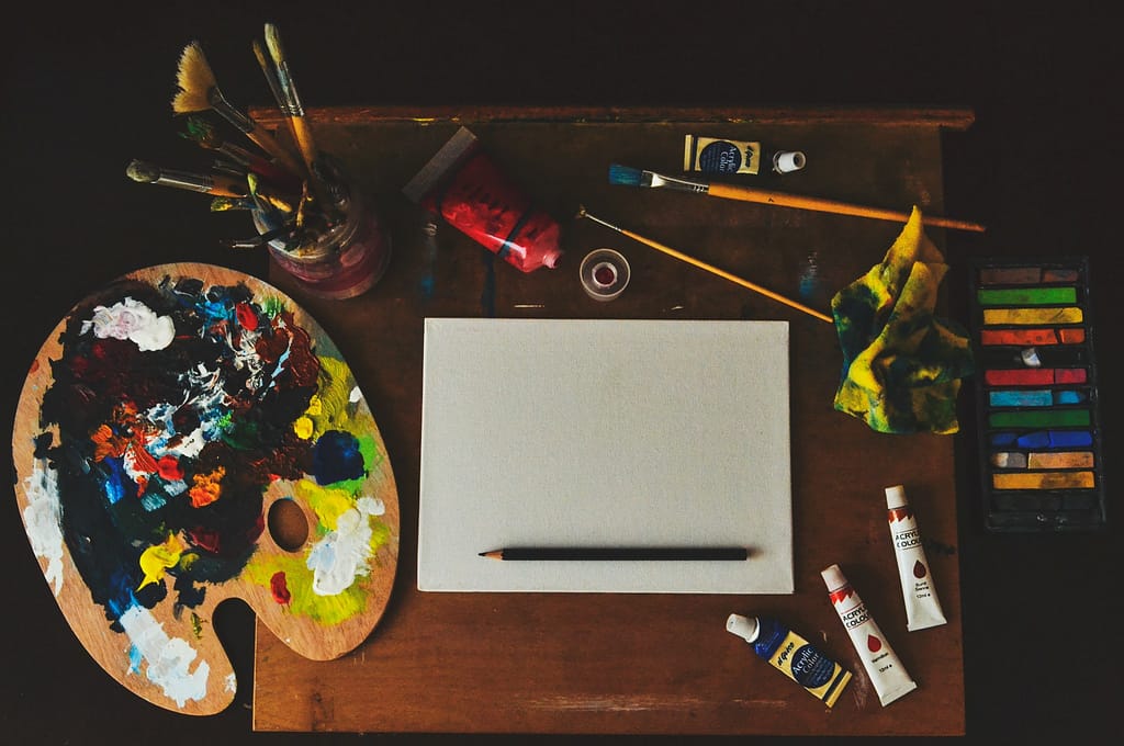 Assorted color artwork equipment on a table