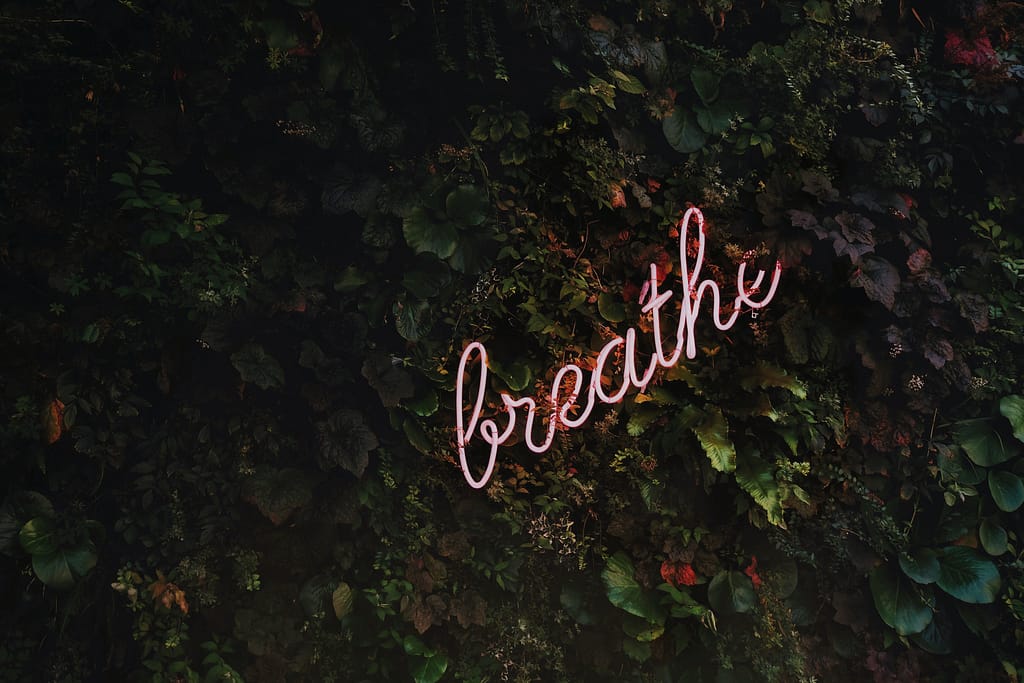 A sign that says breath