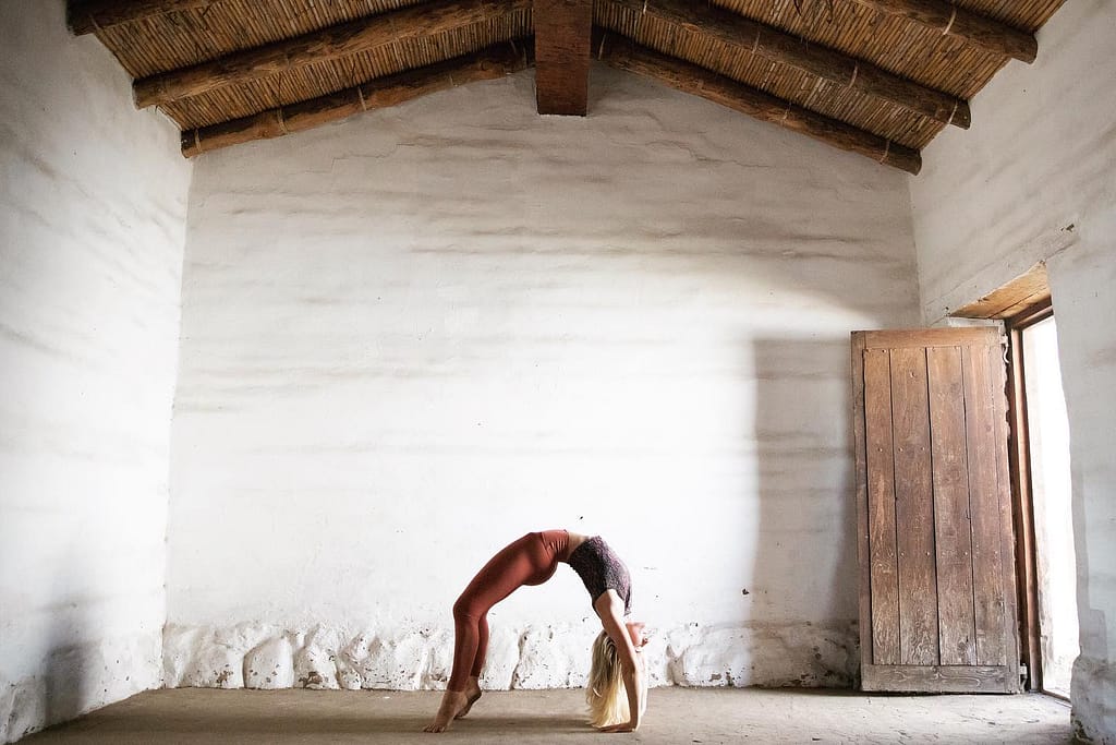 Sierra Noland demonstrating yoga wheel pose