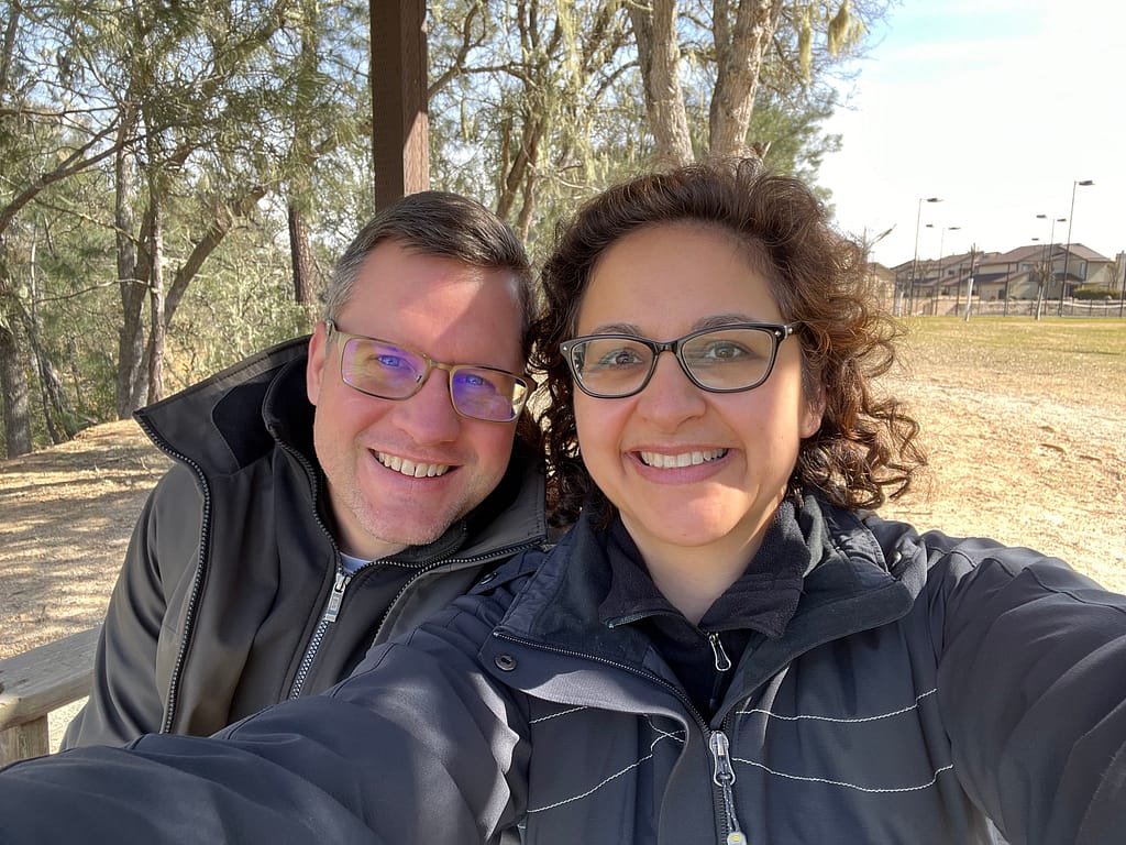 Pantea Rahimian and her husband taking a selfie at a park